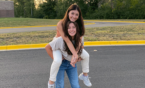 Two smiling young women