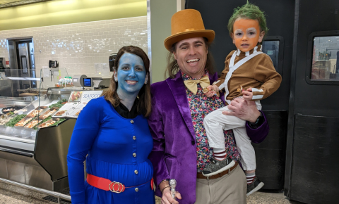 Family dressed in Halloween costumes