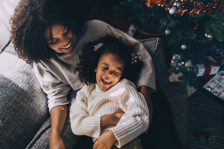 Mom and daughter on couch during holidays